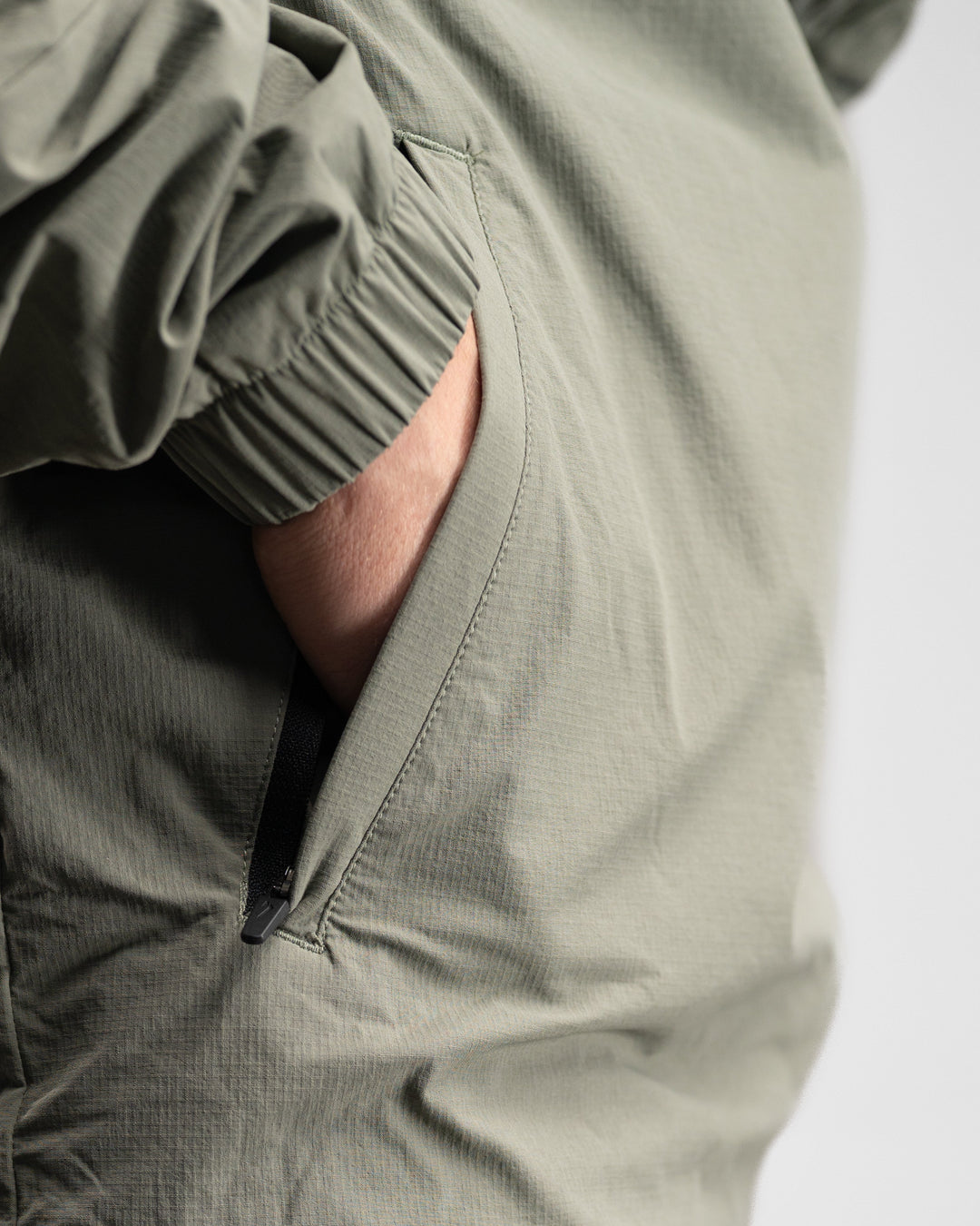 Elite Windbreaker Full Zip (Light Olive) - Athletic Aesthetics
