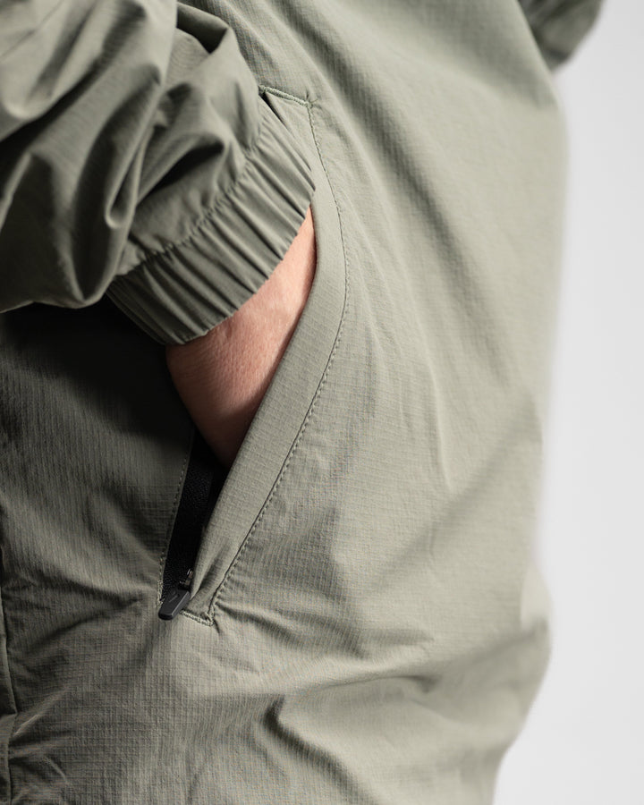 Elite Windbreaker Full Zip (Light Olive) - Athletic Aesthetics